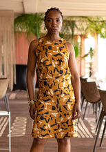 Load image into Gallery viewer, Lady wears a sleeveless Luz Dress in patterned fabric