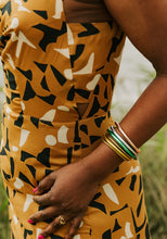 Load image into Gallery viewer, Close up detailing of Luz jumpsuit side panel