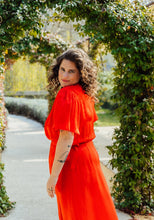 Load image into Gallery viewer, Side view of lady wearing Penelope Dress with flowy short sleeves