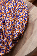 Load image into Gallery viewer, Mandarine EcoVero fabric slightly crumpled on table