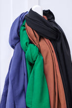 Load image into Gallery viewer, Vida Voile with TENCEL Lyocell fibres fabric in four different colours hangs and drapes over singular hook