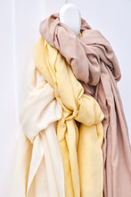 Load image into Gallery viewer, Three different colours of Vida Voile fabric tied in knots placed on top of one another on a hook