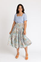 Load image into Gallery viewer, Lady wears a square neckline tee, with an elasticated waistline, tiered skirt