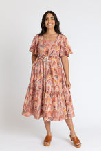 Load image into Gallery viewer, Lady wears a square neckline dress, tiered skirt with side inseam pockets, and elasticated corded waist
