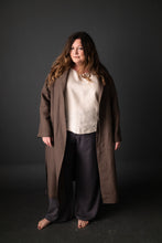 Load image into Gallery viewer, Front view of lady wearing 101 Trousers long and straight with long overcoat
