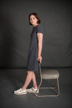 Load image into Gallery viewer, Lady leans on chair wearing Camber Set T-Shirt dress