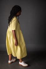 Load image into Gallery viewer, Side view of lady wearing Ellis Dress in gingham fabric