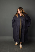 Load image into Gallery viewer, Lady wears duster overcoat unfastened with hands in pockets