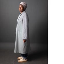 Load image into Gallery viewer, Lady stands wearing a duster style overcoat