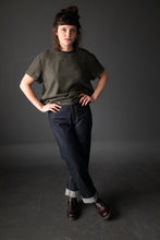 Load image into Gallery viewer, Lady wears a Tee Shirt in one colour