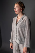 Load image into Gallery viewer, Lady wears pyjama top with long sleeves, cuffs turned up