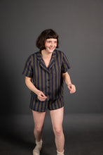 Load image into Gallery viewer, Lady wears a short sleeved pyjama shirt and shorts