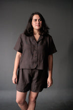 Load image into Gallery viewer, Lady wears a short sleeved pyjama shirt and shorts