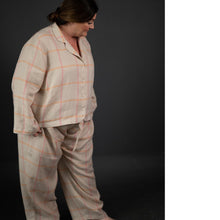 Load image into Gallery viewer, Lady wears a long sleeve pyjama top and long pyjama trousers