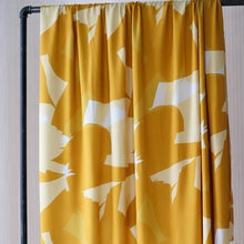 Load image into Gallery viewer, EcoVero Viscose hangs on rail shows off fluid drape