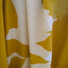 Load image into Gallery viewer, Close up of EcoVero Viscose fabrics shows fluid drape