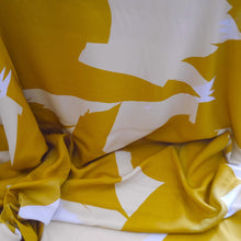 Load image into Gallery viewer, Fabric folds against table shows a soft fluid drape