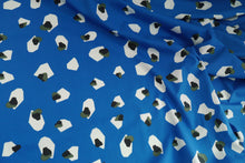 Load image into Gallery viewer, Fabric slightly scrunched up shows drape of Marlie-Lawn Cotton Fabric, with print of gemstones.