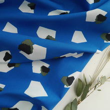 Load image into Gallery viewer, Fabric slightly scrunched up shows drape of Marlie-Lawn Cotton Fabric, with print of gemstones.