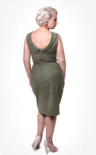Load image into Gallery viewer, Back view of lady wearing green sleeveless dress with a lack back neckline, and pencil skirt.