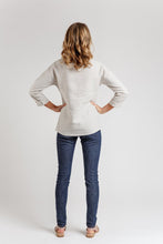 Load image into Gallery viewer, Back view of lady wearing Olive blouse, that sits below hip length