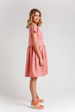 Load image into Gallery viewer, Side view of lady wearing short sleeve top and gathered waist, knee length dress