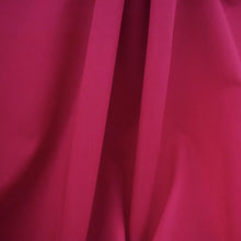 Load image into Gallery viewer, Organic Candy Cotton fabric hangs, displays soft fluid drape