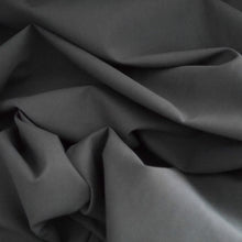 Load image into Gallery viewer, Organic Candy Cotton Fabric crumpled, displaying soft drape