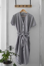 Load image into Gallery viewer, V-neck button front dress made from Organic Cotton Double Gauze fabric hangs on hanger