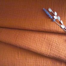 Load image into Gallery viewer, Organic Cotton Double Gauze fabric softly folded displayed with dried flower stems