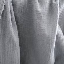 Load image into Gallery viewer, Organic Cotton Double Gauze fabrics hang, showing a soft drape