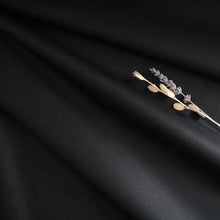 Load image into Gallery viewer, Organic Cotton Poplin fabric slightly crumpled shows soft drape