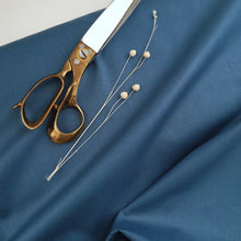 Load image into Gallery viewer, Organic Cotton Poplin fabric bolt rolled out, displayed with scissors and dried flower
