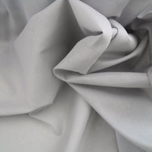Load image into Gallery viewer, Close up of Organic Cotton Voile scrunched shows sheerness and structural drape