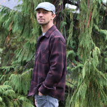 Load image into Gallery viewer, Side view of a man wearing an Overshirt Jacket in plaid pattern fabric, worn with jeans