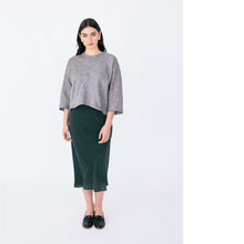 Load image into Gallery viewer, Lady wears variation two of the Pinnacle Top showing off the front triangle panels. Round neckline, loose 3/4 length sleeves.