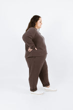 Load image into Gallery viewer, Side view of lady wearing Solar Sweater