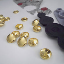 Load image into Gallery viewer, 19mm metal cover button blanks displayed next to cover tool and circular piece of fabric