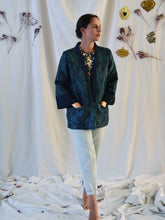 Load image into Gallery viewer, Front view of lady wearing Sable Jacket with hands in two pockets near hem.