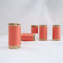 Load image into Gallery viewer, Five wooden reels of Scanfil Organic Cotton Thread in Salmon