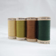 Load image into Gallery viewer, Four wooden reels of Scanfil Organic Cotton Thread in Straw, Celery, Acorn Brown and Forest Green colours.