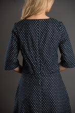 Load image into Gallery viewer, Back view of lady wearing The A-Line Dress, shows a Centre Back seam with concealed zipper fastening