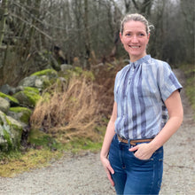 Load image into Gallery viewer, Lady stands with hand in pocket, wearing SIlle Shirt, made in Stripe pattern fabric.