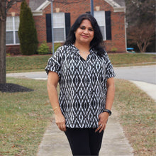Load image into Gallery viewer, Lady stands wearing Sille Shirt