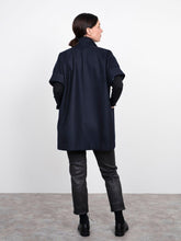 Load image into Gallery viewer, Back view of lady wearing Cap Sleeve Vest with hands in front patch pockets at hip level