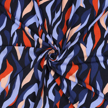 Load image into Gallery viewer, EcoVero Viscose Fabric with abstract flames print shown with central swirl
