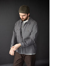 Load image into Gallery viewer, Male wears a think Arbor Jacket playing at the long sleeve cuff turned up
