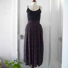 Load image into Gallery viewer, Mannequin displays the Merchant &amp; Mills Shepherd Skirt made using Atelier Brunette&#39;s Candy Rock Tender Toffee Viscose Modal fabric
