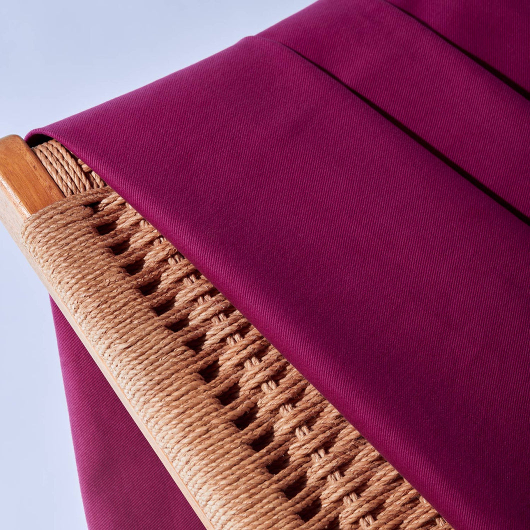 Close up of Cotton Gabardine fabric draped over back of wicker chair