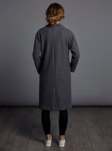 Load image into Gallery viewer, Bak view of lady wearing knee length coat with centre back seam
